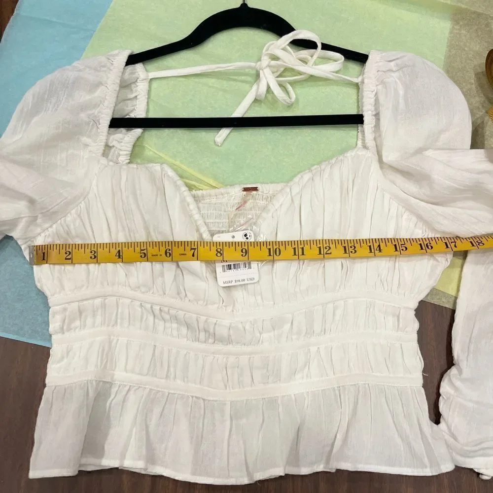 Free People Chloe puff sleeve blouse in white.Size M